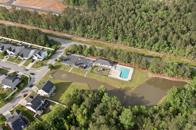 404 Omaha Dr, Moncks Corner, SC 29461 - aerial view of property and surrounding area with a forest, a large body of water, and nearby suburban area