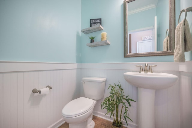 419 Whispering Breeze Ln, Summerville, SC 29486 - bathroom with ornamental molding, wainscoting, wood finished floors, and toilet