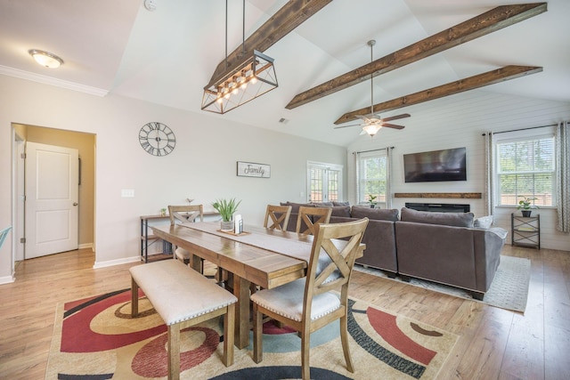 419 Whispering Breeze Ln, Summerville, SC 29486 - dining space featuring light wood-style floors, baseboards, ceiling fan, and lofted ceiling with beams