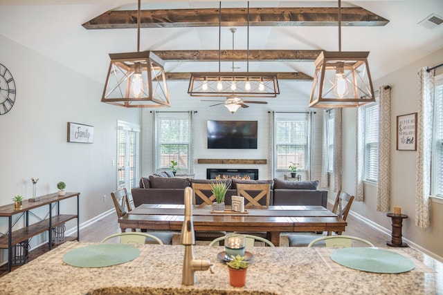 419 Whispering Breeze Ln, Summerville, SC 29486 - living area featuring a large fireplace, ceiling fan, baseboards, and visible vents