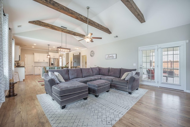 419 Whispering Breeze Ln, Summerville, SC 29486 - living area with beamed ceiling, light wood-style flooring, ceiling fan with notable chandelier, and high vaulted ceiling
