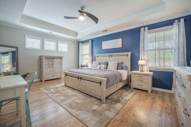 419 Whispering Breeze Ln, Summerville, SC 29486 - bedroom featuring visible vents, ornamental molding, a raised ceiling, and light wood-style floors