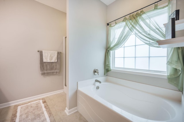 419 Whispering Breeze Ln, Summerville, SC 29486 - full bath with a garden tub, baseboards, and an enclosed shower