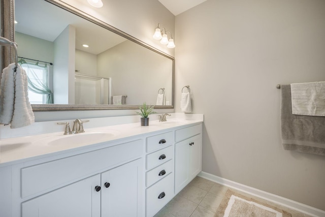 419 Whispering Breeze Ln, Summerville, SC 29486 - full bathroom featuring double vanity, baseboards, a sink, and tile patterned floors
