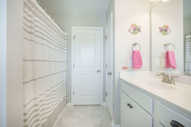 419 Whispering Breeze Ln, Summerville, SC 29486 - bathroom with vanity, baseboards, and a shower with shower curtain