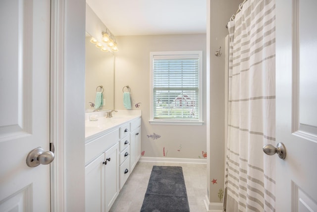 419 Whispering Breeze Ln, Summerville, SC 29486 - bathroom featuring double vanity, a sink, curtained shower, and tile patterned floors