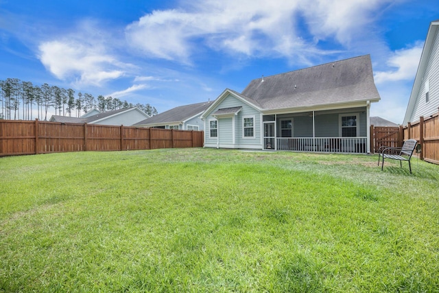 419 Whispering Breeze Ln, Summerville, SC 29486 - rear view of house with a sunroom, a fenced backyard, and a yard