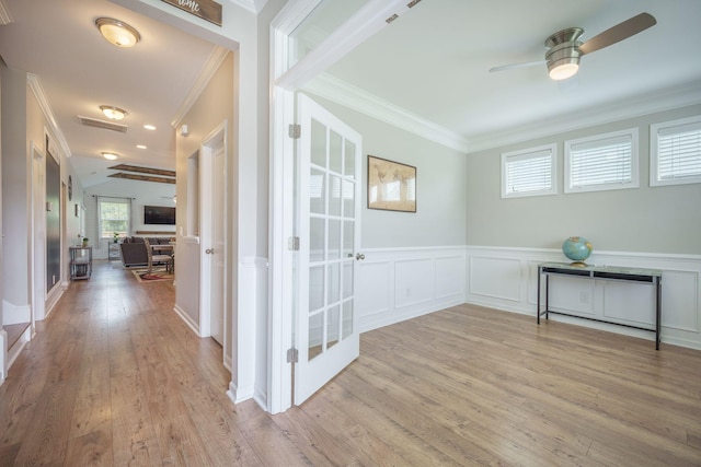 419 Whispering Breeze Ln, Summerville, SC 29486 - interior space with visible vents, ornamental molding, light wood-style floors, and a wainscoted wall