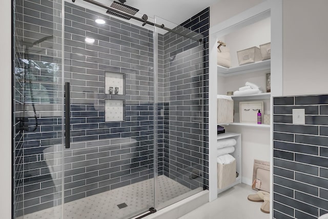 bathroom featuring a shower stall