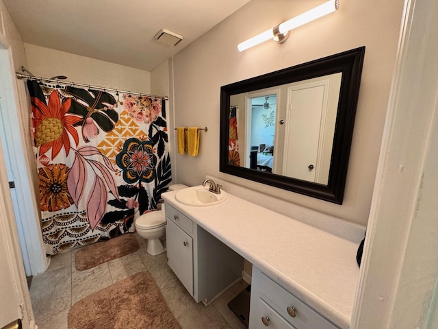 bathroom featuring vanity, curtained shower, toilet, and visible vents