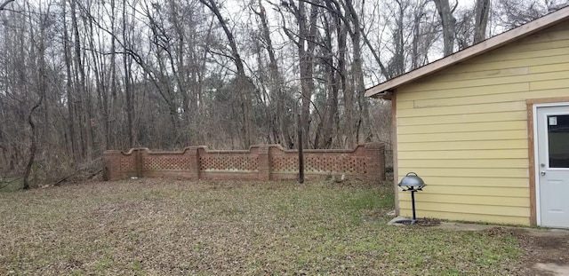 view of yard with fence