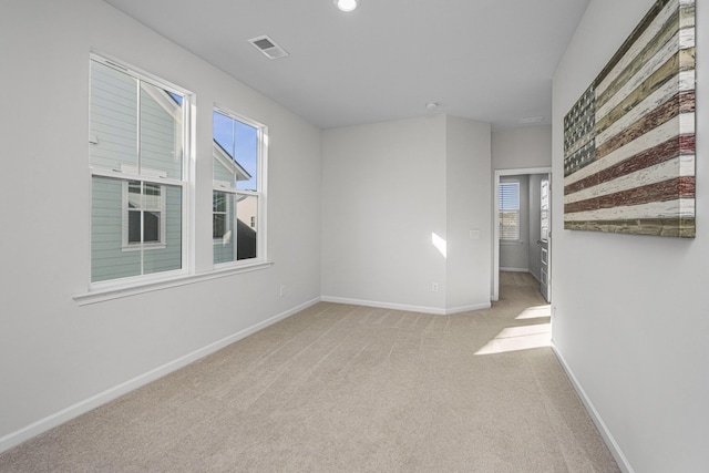 view of carpeted spare room