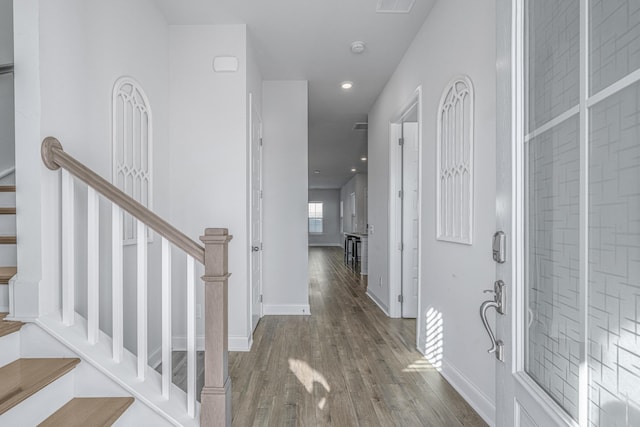 foyer entrance with wood-type flooring