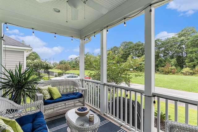 exterior space featuring ceiling fan