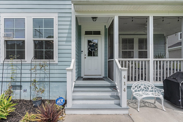 entrance to property with covered porch