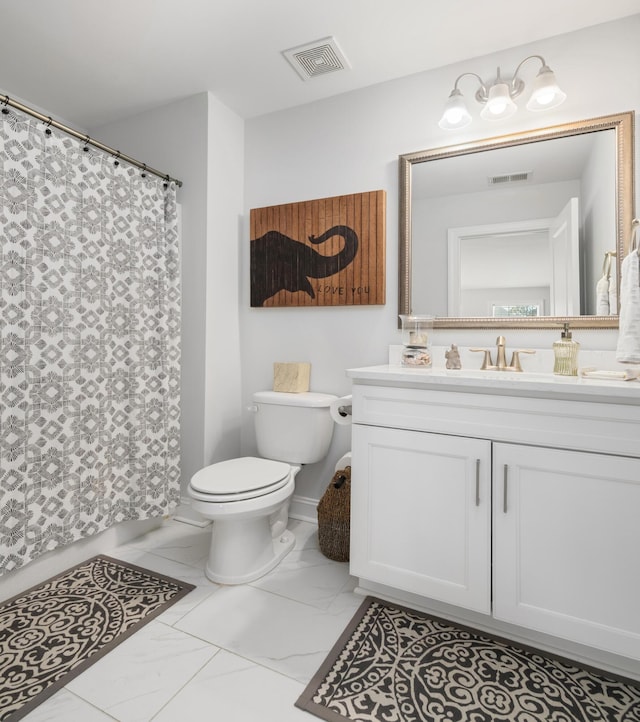 bathroom featuring visible vents, toilet, marble finish floor, and vanity