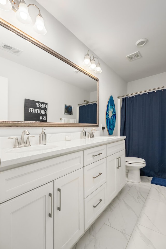 full bath with a sink, visible vents, marble finish floor, and double vanity