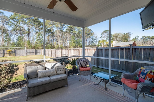 sunroom / solarium with ceiling fan