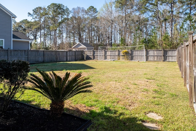 view of yard with a fenced backyard