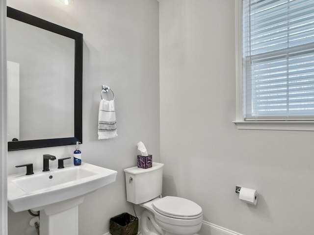 bathroom featuring sink and toilet