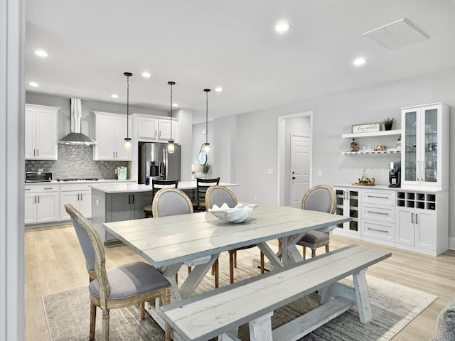 dining area featuring light hardwood / wood-style flooring