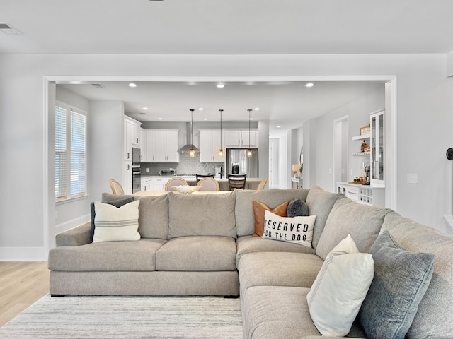 living room featuring light hardwood / wood-style floors