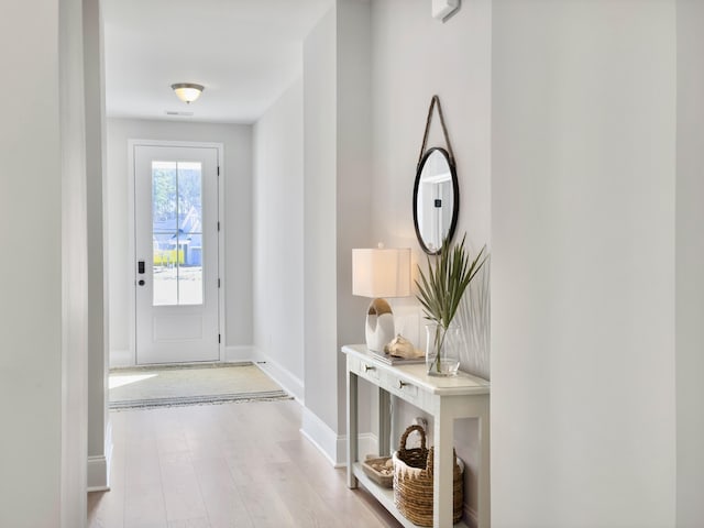 doorway featuring light wood-type flooring