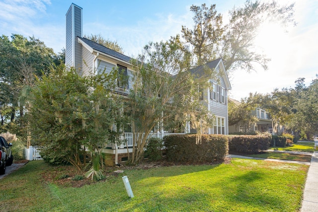 view of front of home with a front lawn