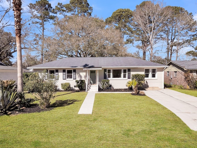 single story home with driveway and a front yard