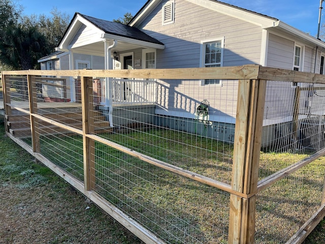 view of property exterior with a lawn