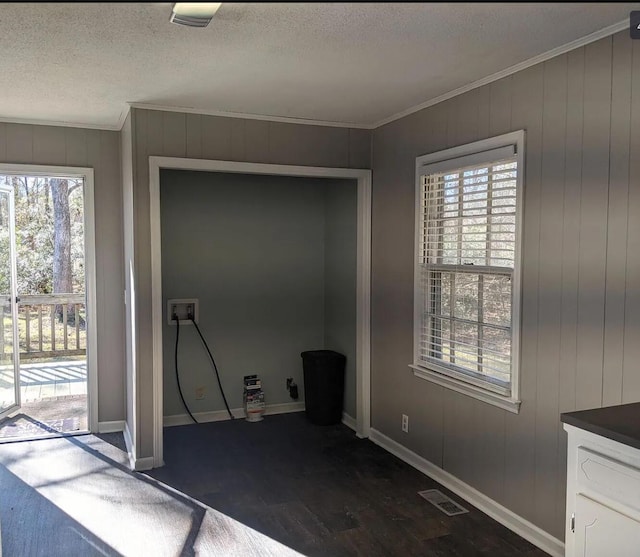 3567 Dewey Cox Rd, Lake City, SC 29560 - interior space with ornamental molding, a textured ceiling, baseboards, access to outside, and dark wood-type flooring