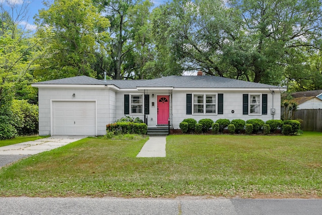 single story home featuring a garage and a front lawn