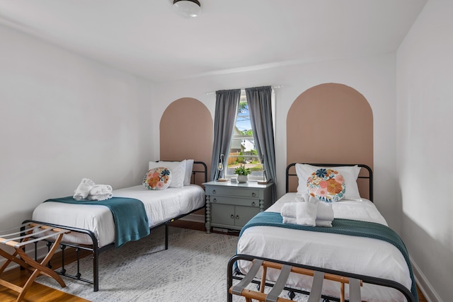 bedroom with light wood-type flooring