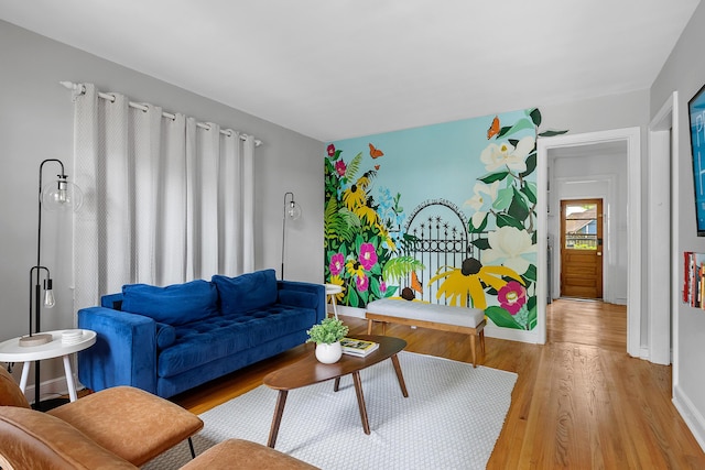 living room with light hardwood / wood-style floors