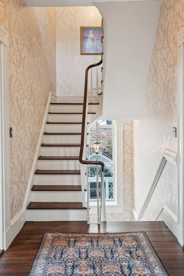 stairway with wood-type flooring