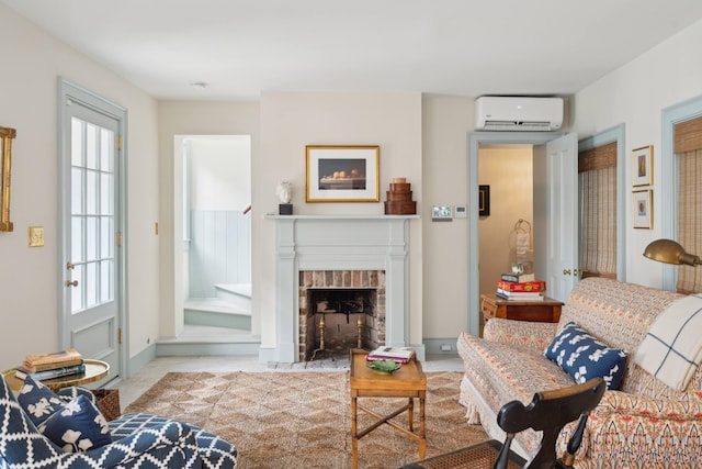 living room with a wall mounted AC and a brick fireplace