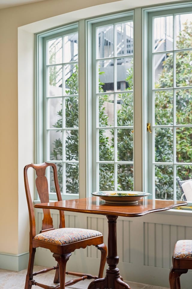 interior space with a healthy amount of sunlight and radiator