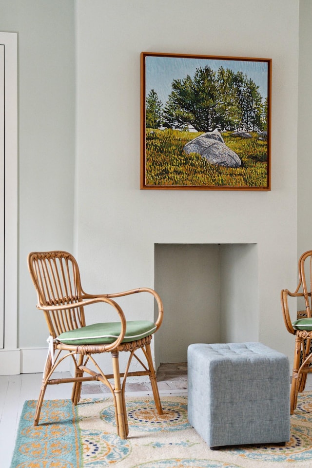 sitting room featuring hardwood / wood-style floors