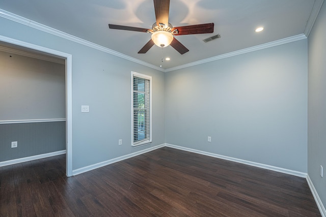 spare room with ceiling fan, dark hardwood / wood-style floors, and ornamental molding