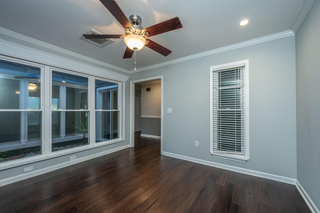 empty room featuring ornamental molding, dark wood-type flooring, and ceiling fan