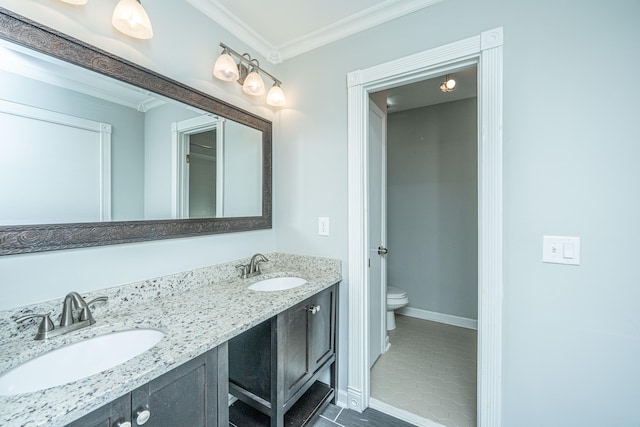 bathroom with ornamental molding, tile patterned flooring, vanity, and toilet