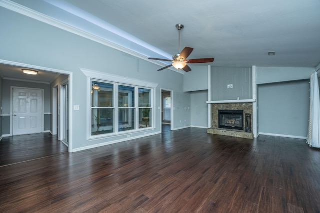 unfurnished living room with a stone fireplace, dark hardwood / wood-style flooring, and ceiling fan