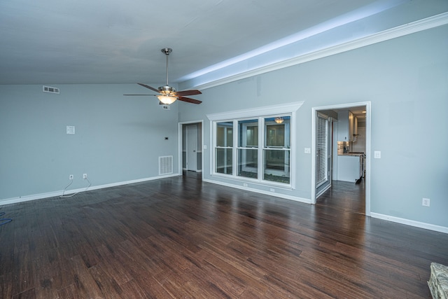 unfurnished living room featuring ceiling fan, dark hardwood / wood-style floors, and vaulted ceiling