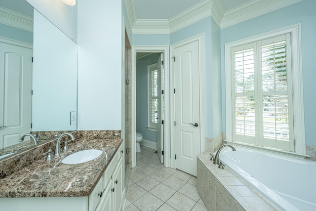 bathroom with vanity, toilet, tiled bath, and crown molding