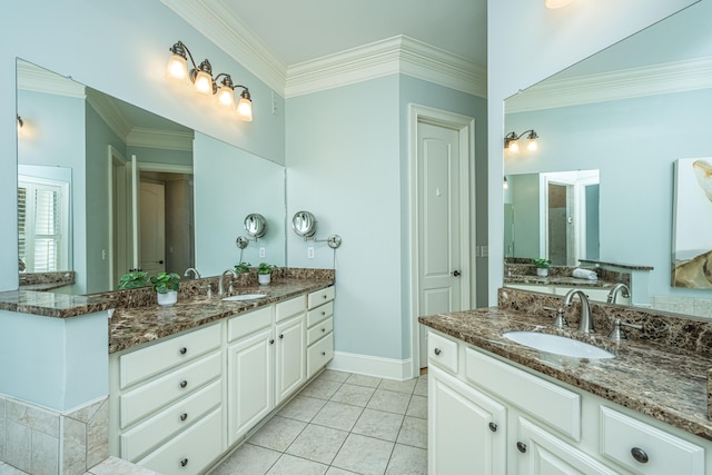 bathroom featuring vanity, ornamental molding, and tile patterned flooring