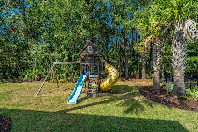 view of jungle gym featuring a lawn