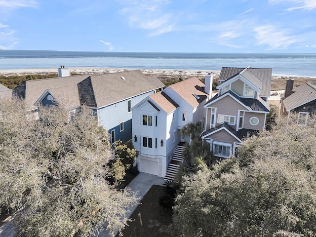 aerial view featuring a beach view and a water view