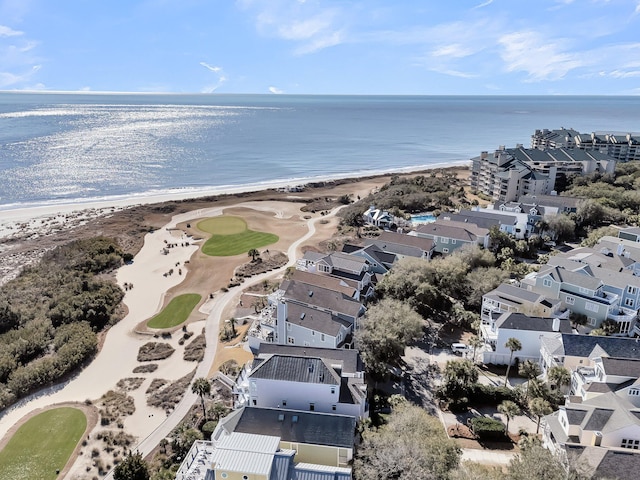 bird's eye view featuring a water view and a view of the beach