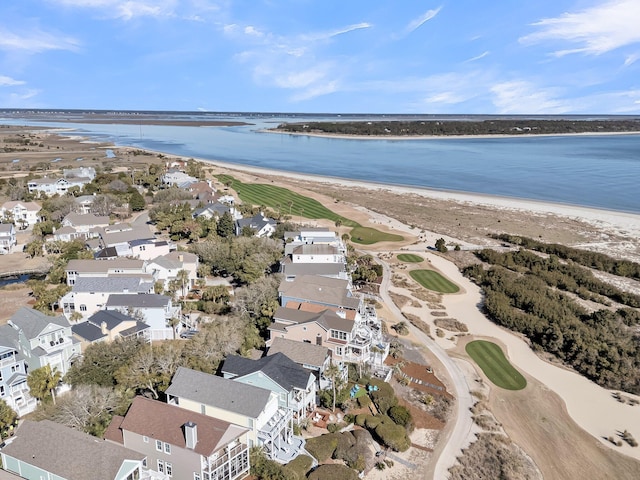 drone / aerial view featuring a residential view and a water view