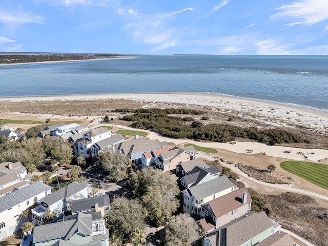 aerial view featuring a residential view, a water view, and a view of the beach